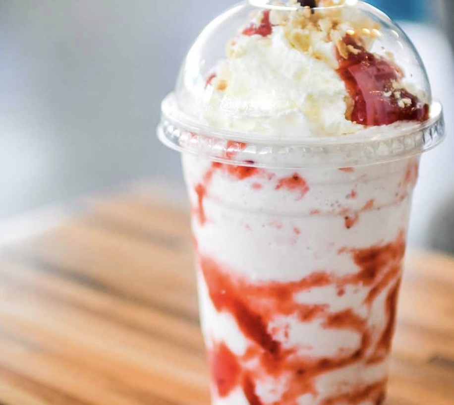 Strawberry milkshake with strawberry sauce